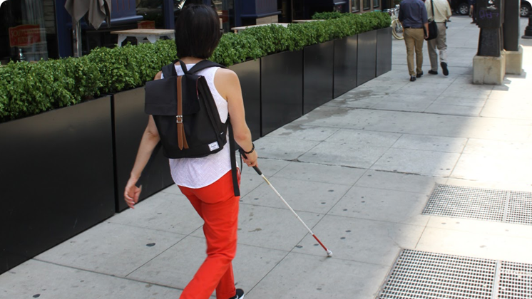 woman walking with cane